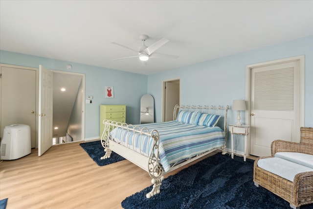 3761 Hunt Rd, Lapeer, MI 48446 - bedroom with wood finished floors and a ceiling fan