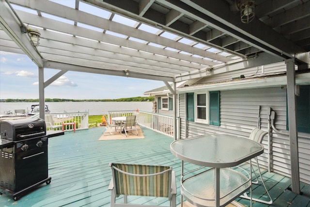 3761 Hunt Rd, Lapeer, MI 48446 - wooden deck featuring outdoor dining area, a pergola, a water view, and grilling area