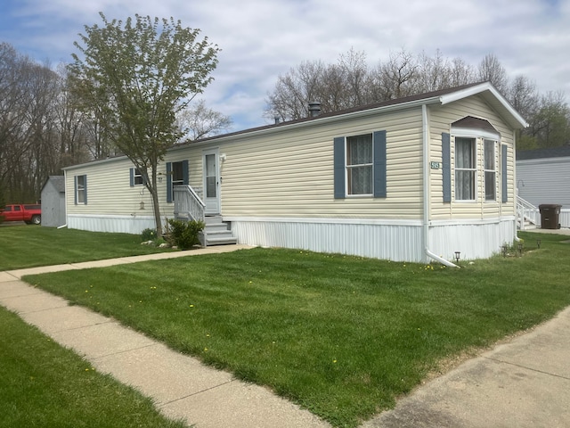 515 E Pond Vw, Morrice, MI 48857 - manufactured / mobile home with a front lawn