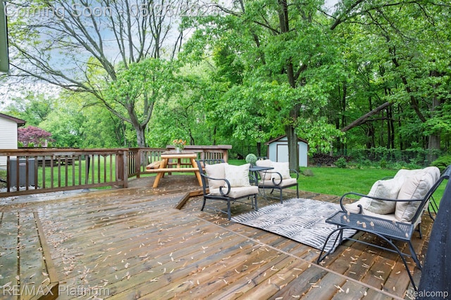 638 Glenwyth Rd, Brighton, MI 48116 - wooden terrace featuring a lawn and outdoor dining area
