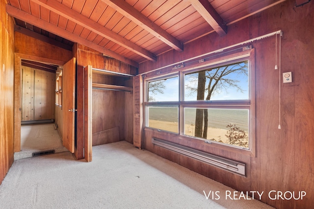 17933 N Shore Estates Rd, Spring Lake, MI 49456 - hallway with wooden walls, wood ceiling, and carpet flooring