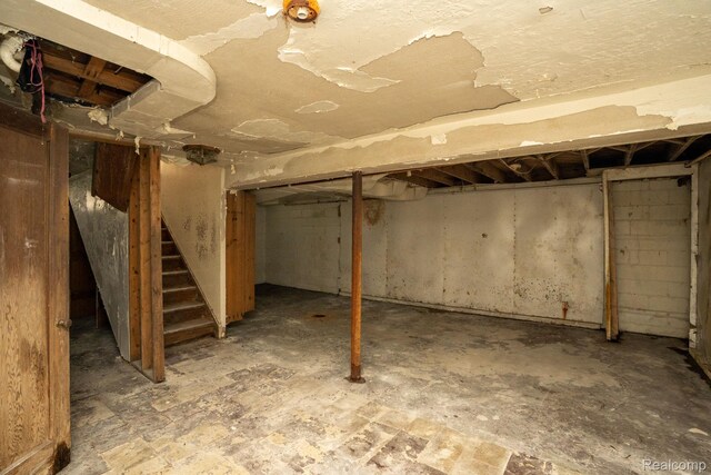19610 Norwood St, Detroit, MI 48234 - unfinished basement featuring stairway