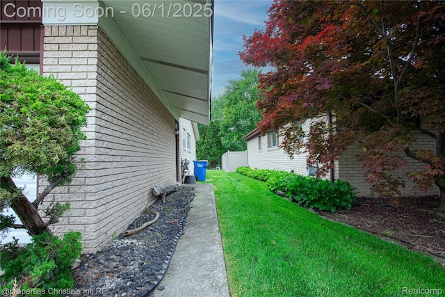 30571 Cedars Dr, Warren, MI 48093 - view of home's exterior featuring a yard