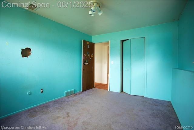 30571 Cedars Dr, Warren, MI 48093 - unfurnished bedroom with carpet and a closet