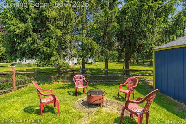 9863 Marshall Rd, South Lyon, MI 48178 - view of yard with a fire pit