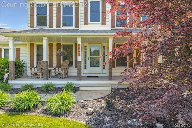 9863 Marshall Rd, South Lyon, MI 48178 - doorway to property with a porch and a shingled roof