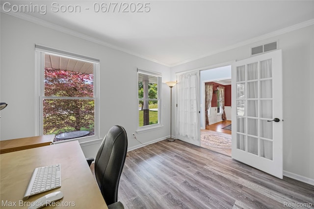 9863 Marshall Rd, South Lyon, MI 48178 - home office with ornamental molding, wood finished floors, french doors, and baseboards