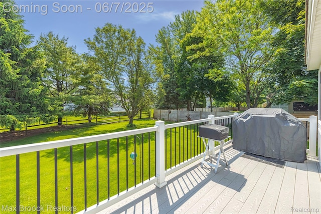 9863 Marshall Rd, South Lyon, MI 48178 - wooden deck featuring area for grilling