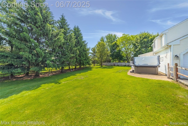 9863 Marshall Rd, South Lyon, MI 48178 - view of yard featuring a hot tub