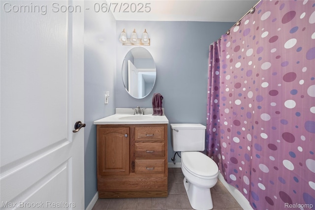 9863 Marshall Rd, South Lyon, MI 48178 - bathroom with vanity, toilet, tile patterned flooring, baseboards, and a shower with shower curtain