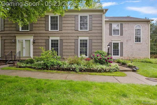 1477 Carriage Ln, Rochester Hills, MI 48306 - view of side of property with a yard and brick siding