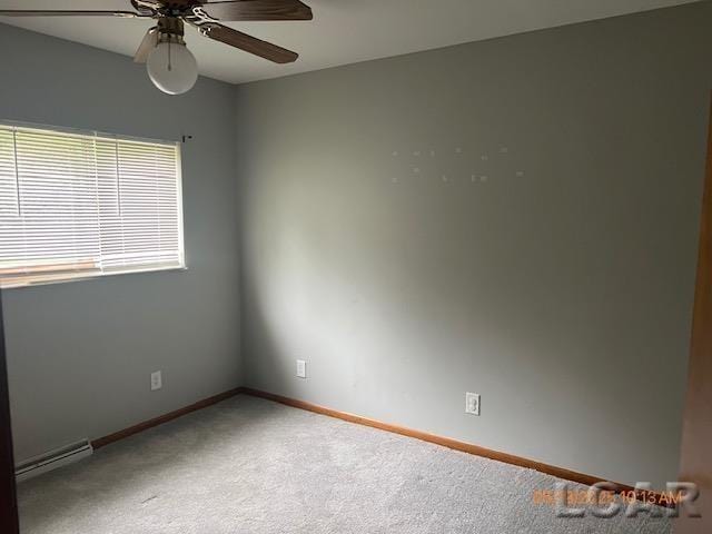 6730 Summerfield Rd, Temperance, MI 48182 - unfurnished room with baseboard heating, a ceiling fan, carpet flooring, and baseboards