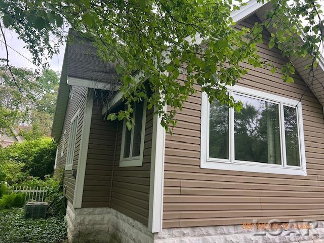 6730 Summerfield Rd, Temperance, MI 48182 - view of side of property with central AC unit
