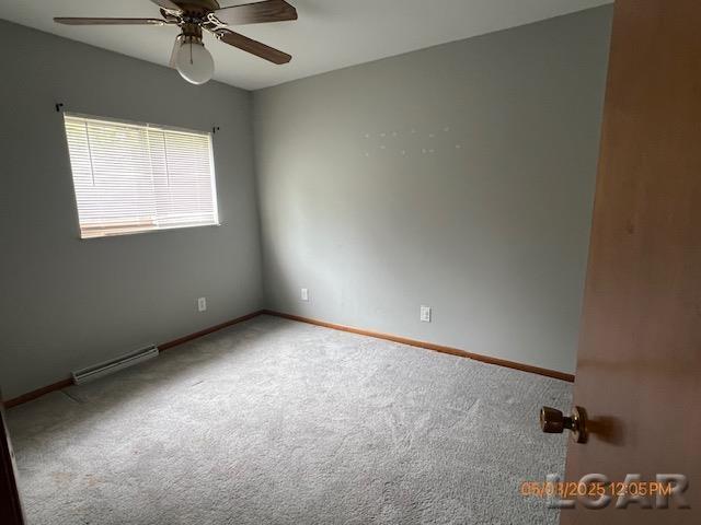 6730 Summerfield Rd, Temperance, MI 48182 - unfurnished room featuring a ceiling fan, carpet, and baseboards