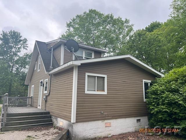 6730 Summerfield Rd, Temperance, MI 48182 - view of side of property with crawl space and a wooden deck