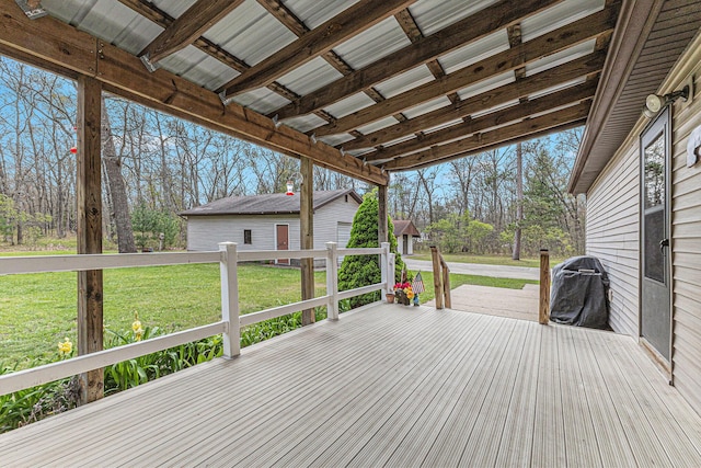 7719 Guenthardt Rd, Manistee, MI 49660 - deck with a yard