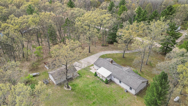 7719 Guenthardt Rd, Manistee, MI 49660 - aerial view of property's location with a heavily wooded area
