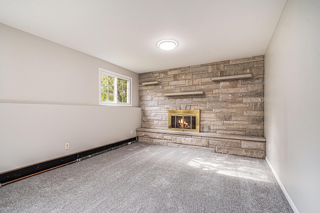 823 W Park Dr, Niles, MI 49120 - unfurnished living room featuring carpet floors, a fireplace, and baseboards