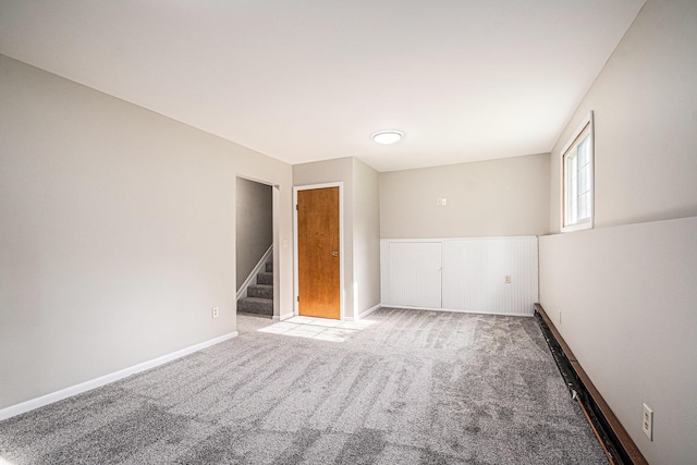 823 W Park Dr, Niles, MI 49120 - empty room featuring carpet, stairs, and baseboards