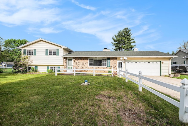 823 W Park Dr, Niles, MI 49120 - split level home featuring driveway, an attached garage, a chimney, and brick siding