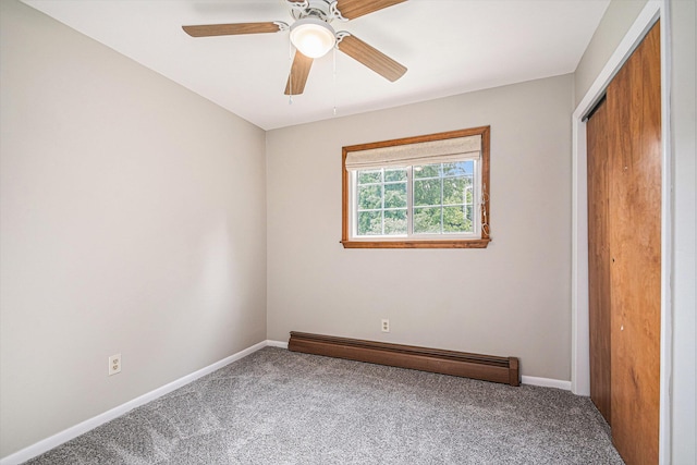 823 W Park Dr, Niles, MI 49120 - unfurnished bedroom featuring carpet, baseboard heating, baseboards, and a closet