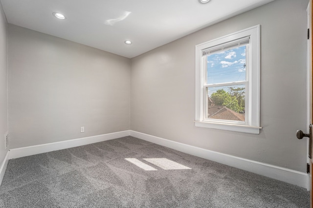 50 Elm St, River Rouge, MI 48218 - carpeted empty room featuring baseboards and recessed lighting