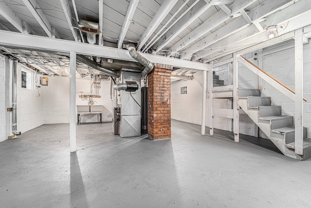 50 Elm St, River Rouge, MI 48218 - basement featuring stairs and heating unit