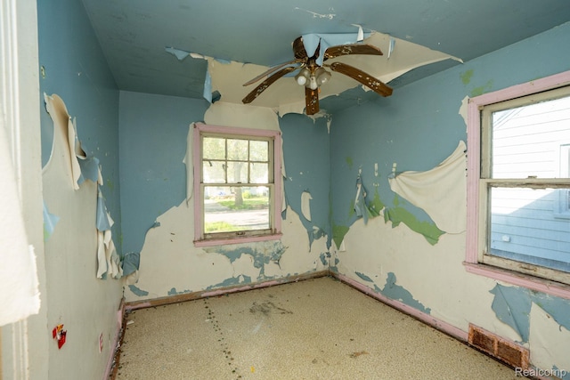 15693 Liberal St, Detroit, MI 48205 - empty room with plenty of natural light and a ceiling fan
