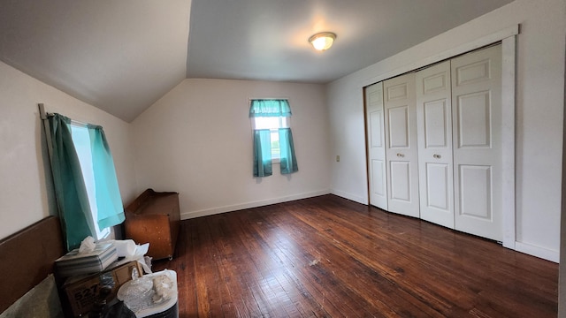 3483 80th Ave, Lakeview, MI 48850 - unfurnished bedroom featuring hardwood / wood-style floors, vaulted ceiling, baseboards, and a closet
