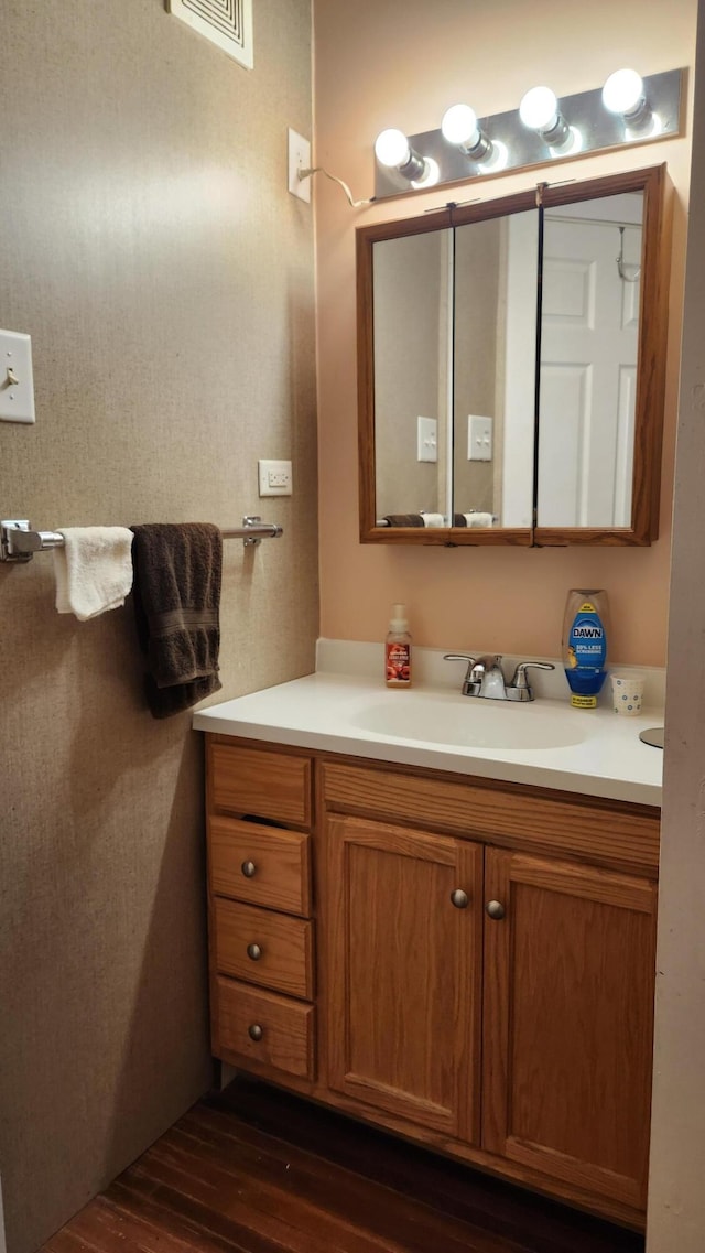 3483 80th Ave, Lakeview, MI 48850 - bathroom with wood finished floors and vanity