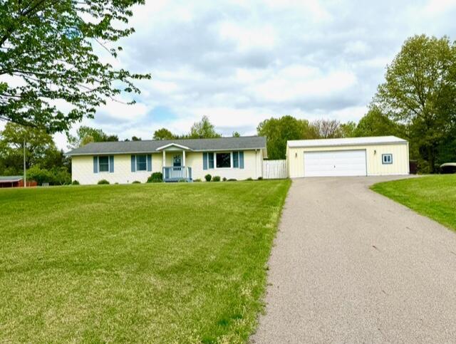 ranch-style home with a garage