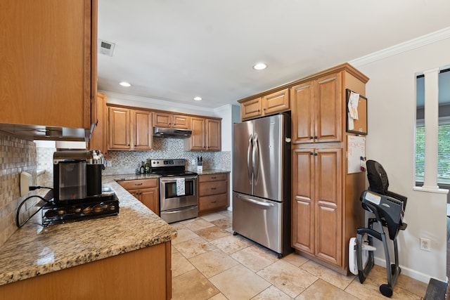 1255 Meadowood Dr, Waterford, MI 48327 - kitchen with stainless steel appliances, under cabinet range hood, crown molding, tasteful backsplash, and brown cabinetry