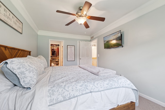 1255 Meadowood Dr, Waterford, MI 48327 - bedroom featuring ornamental molding, a walk in closet, carpet floors, a closet, and baseboards