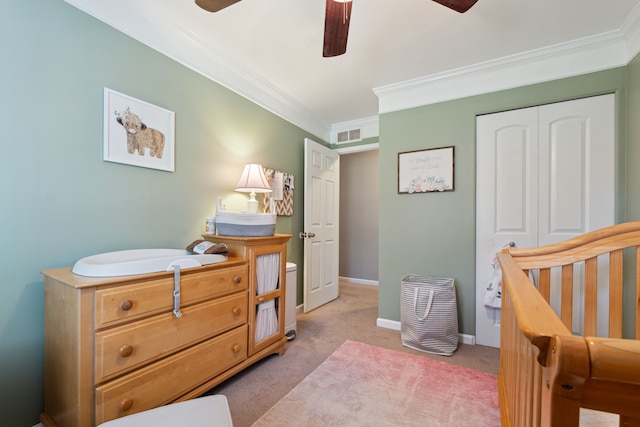 1255 Meadowood Dr, Waterford, MI 48327 - bedroom with light colored carpet, a closet, crown molding, a ceiling fan, and baseboards