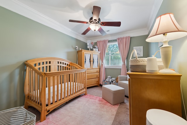 1255 Meadowood Dr, Waterford, MI 48327 - carpeted bedroom with ornamental molding, a crib, and a ceiling fan