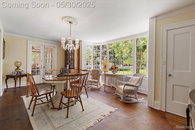 16109 E Jefferson Ave, Grosse Pointe Park, MI 48230 - dining area featuring a chandelier, healthy amount of natural light, hardwood / wood-style floors, and crown molding