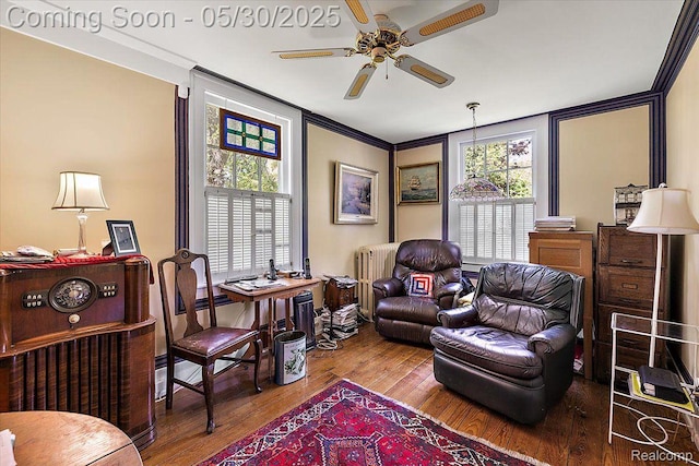 16109 E Jefferson Ave, Grosse Pointe Park, MI 48230 - living area with ceiling fan, wood finished floors, and radiator heating unit