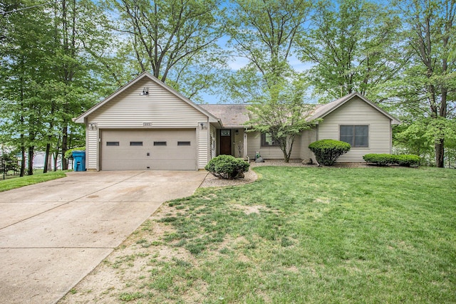 single story home featuring concrete driveway, an attached garage, a front yard, and a shingled roof