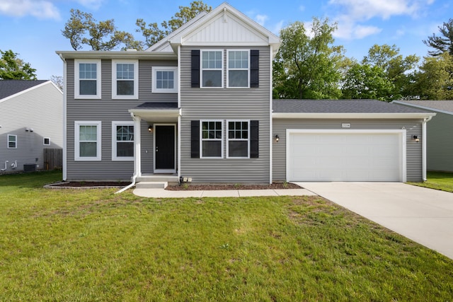 25596 Forest Dr, Mattawan, MI 49071 - view of front of home with an attached garage, driveway, a front yard, board and batten siding, and central AC unit
