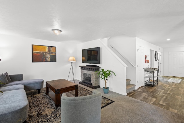 25596 Forest Dr, Mattawan, MI 49071 - living area featuring stairway, a multi sided fireplace, wood finished floors, baseboards, and recessed lighting