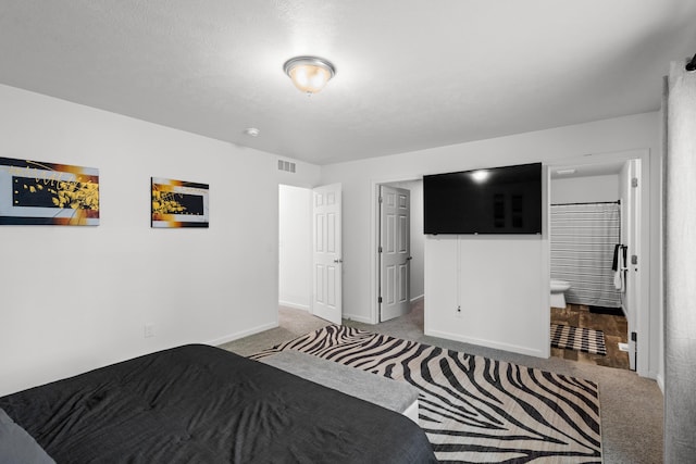 25596 Forest Dr, Mattawan, MI 49071 - carpeted bedroom featuring baseboards and connected bathroom