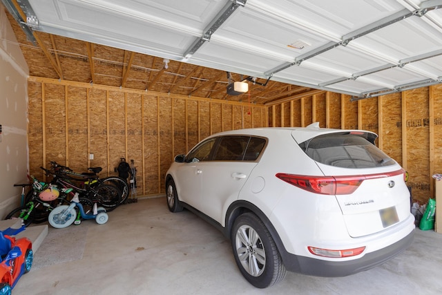 25596 Forest Dr, Mattawan, MI 49071 - garage featuring a garage door opener