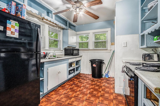 791 La Salle St, Benton Harbor, MI 49022 - kitchen with black appliances, light countertops, a ceiling fan, and a sink