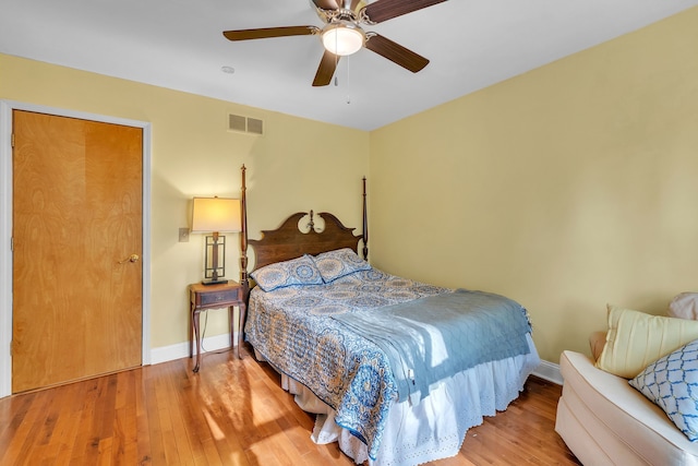 6550 Avon Dr, Brighton, MI 48116 - bedroom with wood finished floors, baseboards, and ceiling fan
