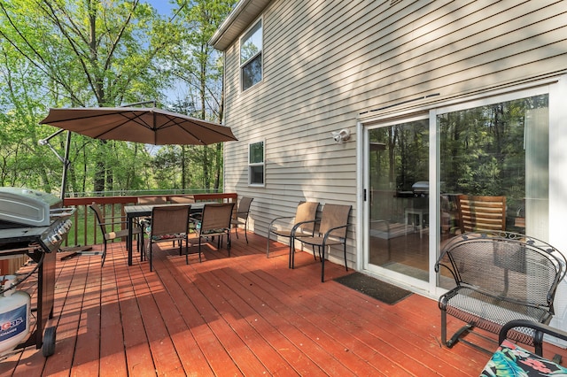 6550 Avon Dr, Brighton, MI 48116 - wooden deck featuring outdoor dining space