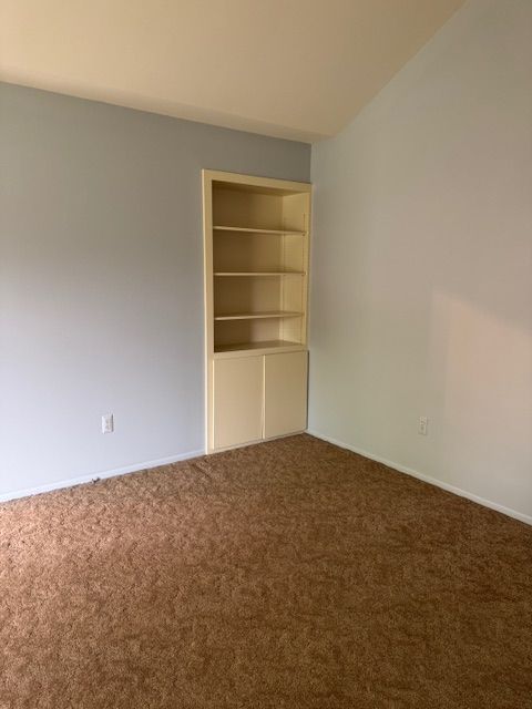 20433 Birch Meadow Dr, Clinton Township, MI 48036 - carpeted empty room featuring baseboards