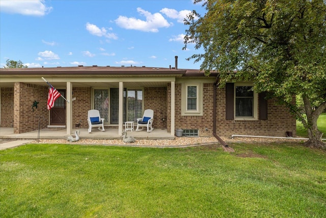 14829 Mayview, Shelby Twp, MI 48315 - back of house featuring brick siding, a lawn, and a patio