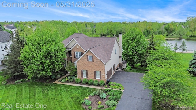 3088 Exeter Dr, Milford, MI 48380 - view of subject property featuring a nearby body of water
