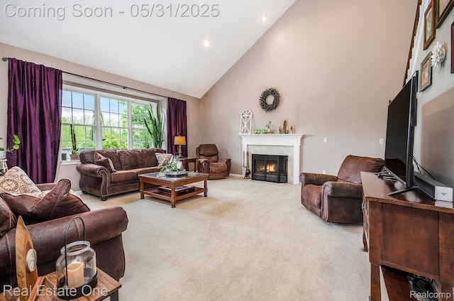 3088 Exeter Dr, Milford, MI 48380 - carpeted living room featuring high vaulted ceiling, a tiled fireplace, and recessed lighting