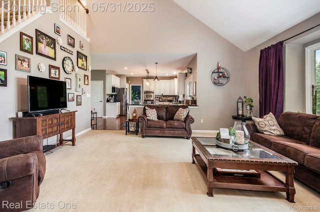 3088 Exeter Dr, Milford, MI 48380 - living area featuring baseboards, light carpet, high vaulted ceiling, and recessed lighting